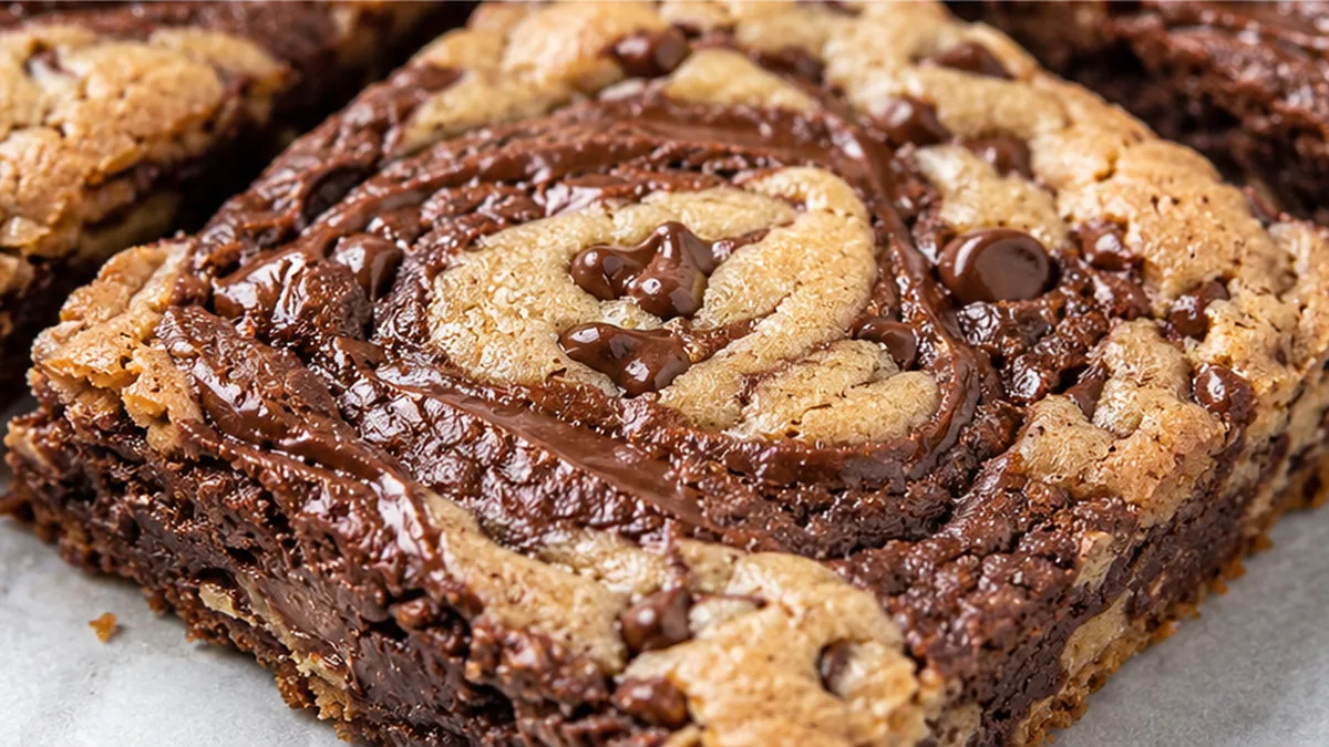 Brownie Cookie Swirls: Ultimate Mashup! Brownie cookie swirls: whip up this delightful dessert with refrigerated dough and brownie mix. A simple, no-bake treat